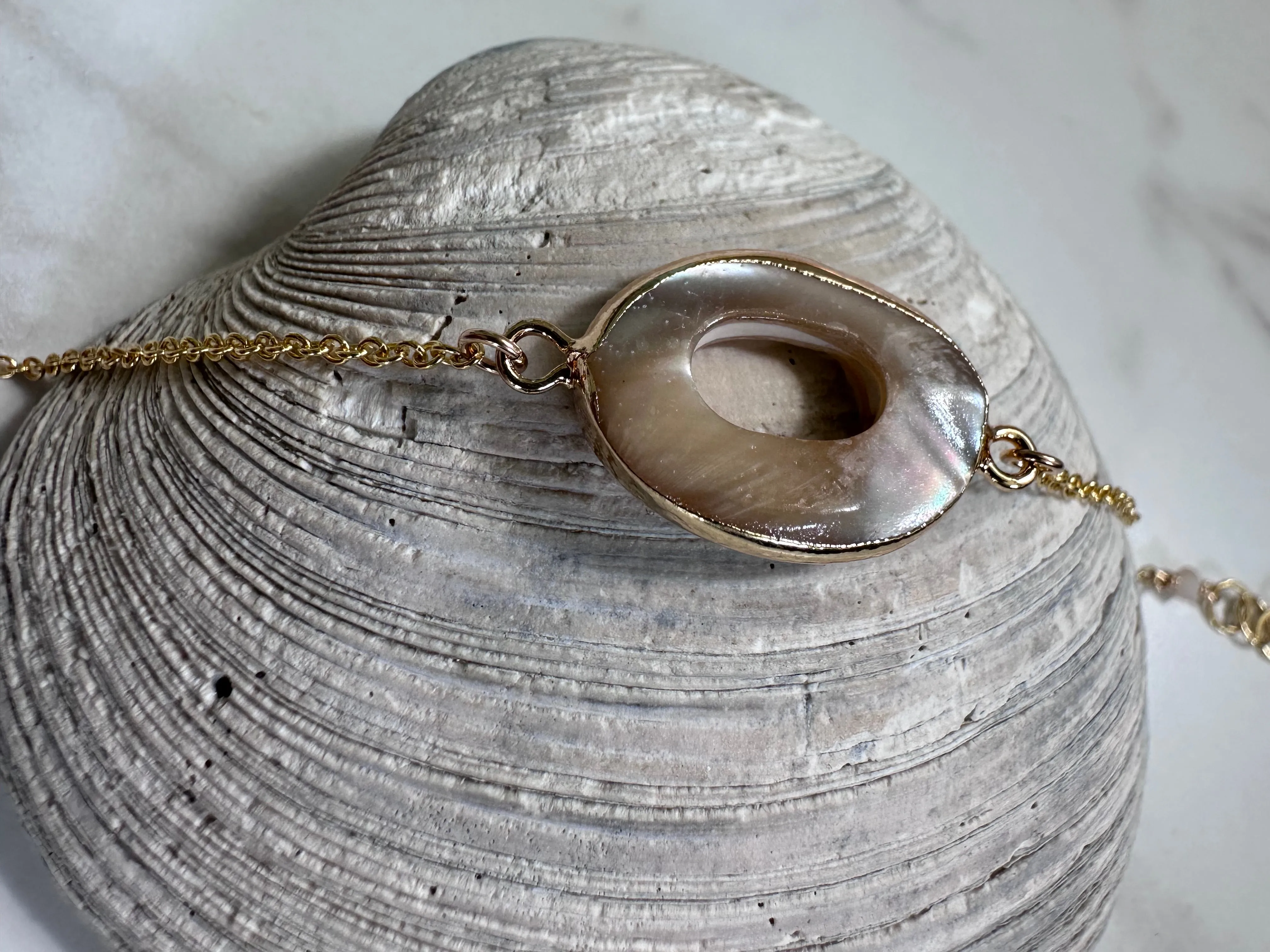 bracelet. mother of pearl gold