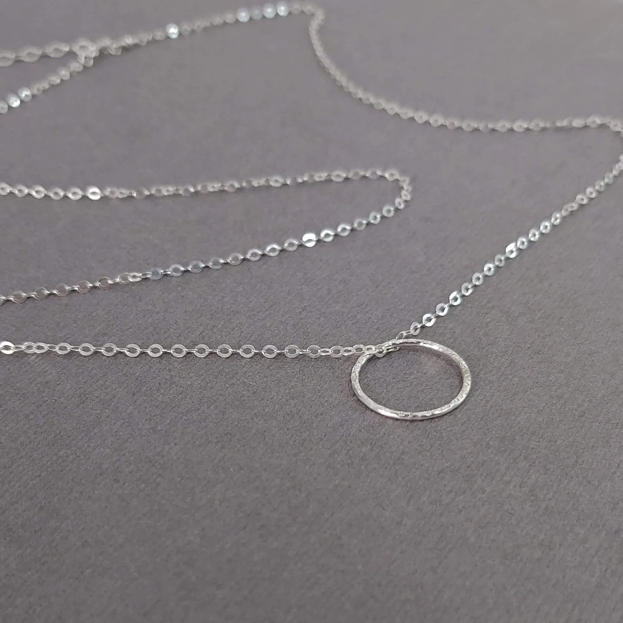 Silver Karma Pendant Necklace