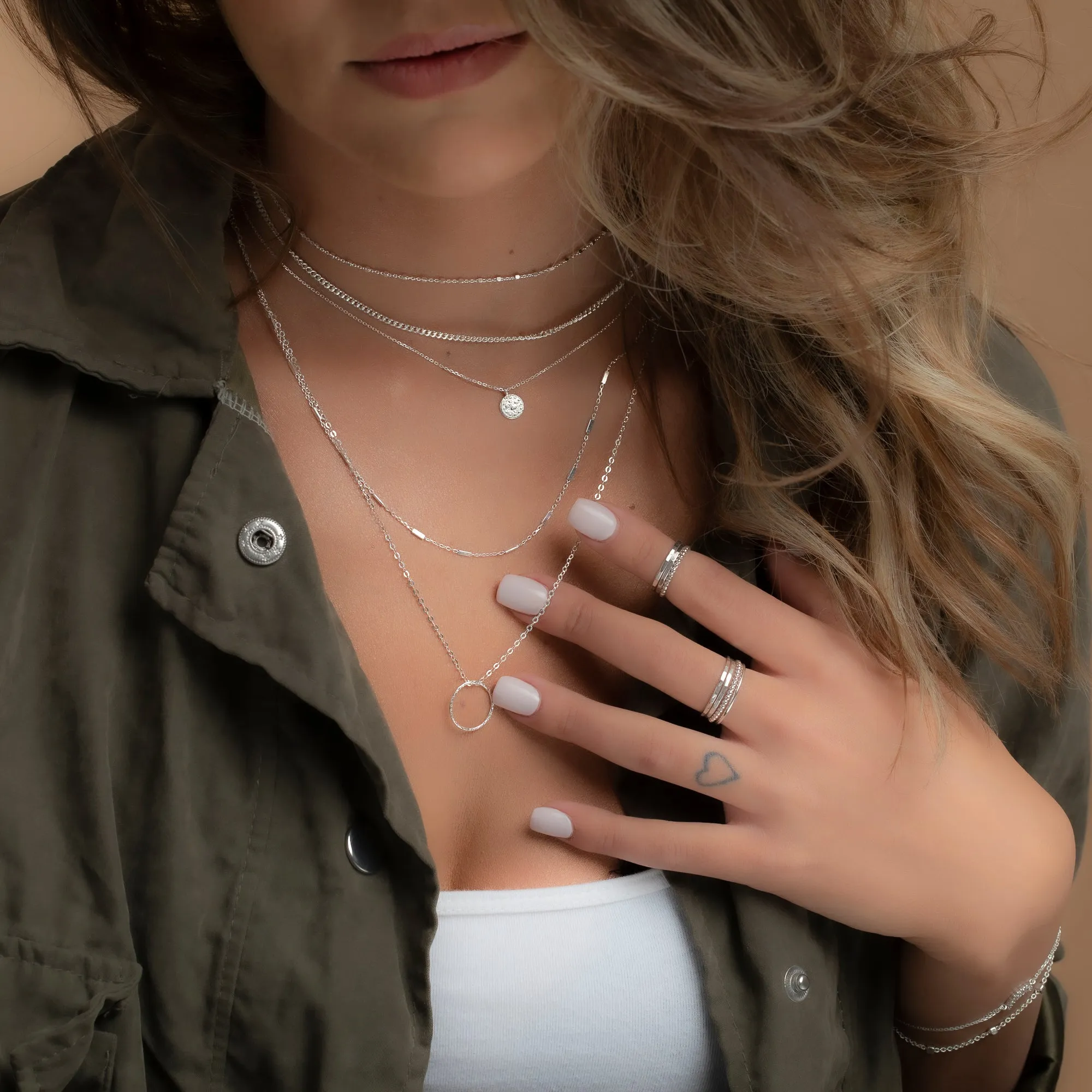 Silver Karma Pendant Necklace