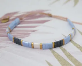 Tila Bead Adjustable Bracelet in Navy Blue, Iridescent Blue, Gold and Iridescent White